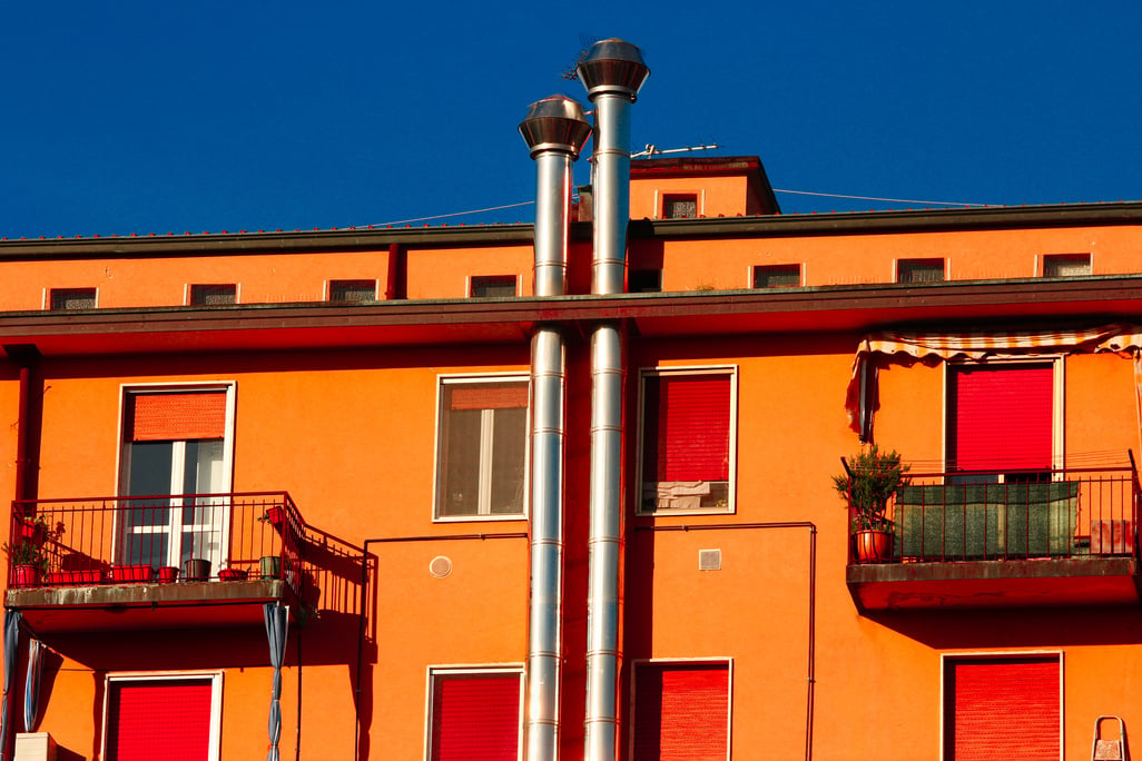 House building with flue and bright colors